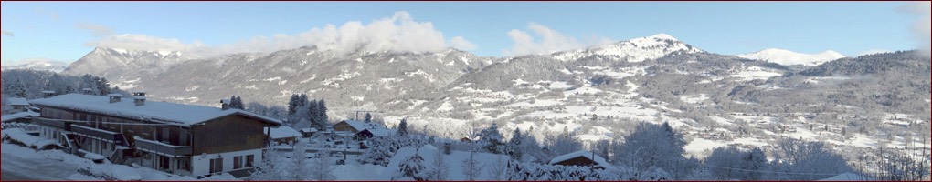 Panorama seen from the chalet lounge Perla de Na in winter